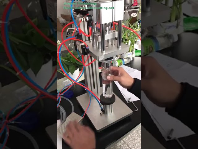 Semi-automatisk pneumatisk parfumekrympe- og kapslingsmaskine